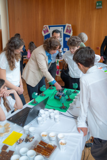 People standing around a table