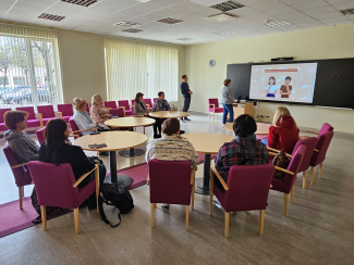 A group of teachers sitting in a circle