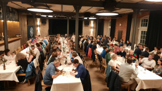 Festival participants at a dinner in a Bavarian brewery