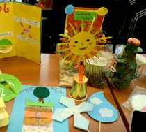 A collection of colourful crafted objects on science topics
