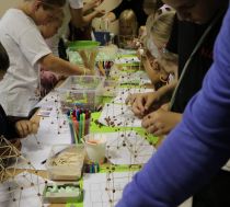A table with science models during a workshop for children
