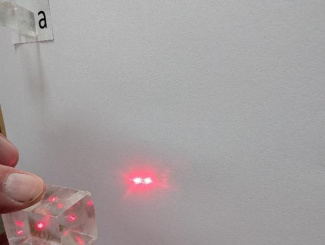 image 4, laser beam through crystal