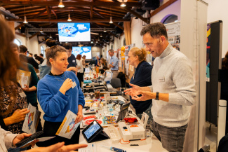 View of a row of stands at an education fair