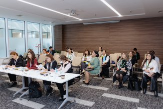 Conference participants in a seminar room