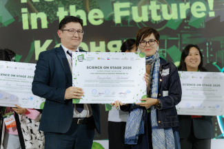 Two people holding an award certificate