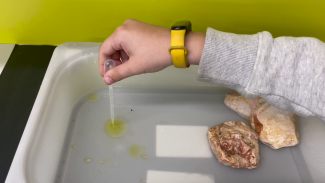 trying to extract cooking oil from water with a pipette