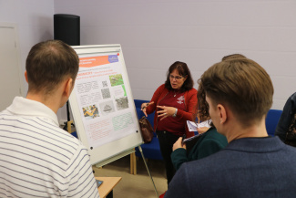 A group of conference attendees in conversation