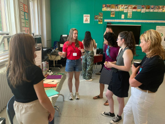 A group of teachers in discussion