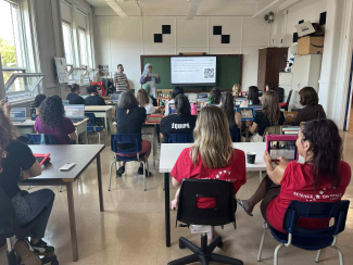 Attendees at a lecture in a seminar room