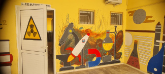 A colourful mural representing science objects