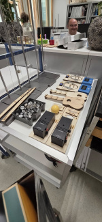A table with equipment for robotics and crafting