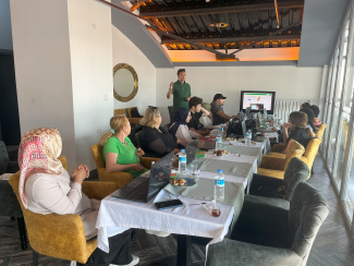 A group of teachers in a seminar room